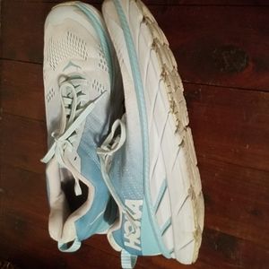Hoka brand running shoes.size 9.5...light blue...Clifton.